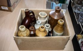 Collection of Stoneware Bottles, 12 in total, various shapes, sizes and colours.