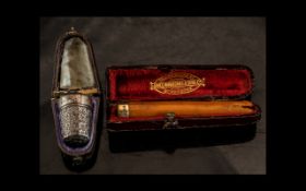 Antique Boxed Dorcas Thimble & Boxed Cigarette Holder, comprising two boxed antique items.