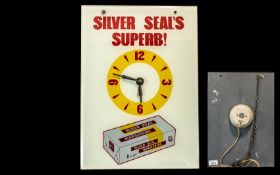 Glass Advertising Clock 'Silver Seal Margarine', mains supply, measures 16'' x 11''.