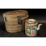 Chinese Famille Rose Teapot, housed in wicket basket.