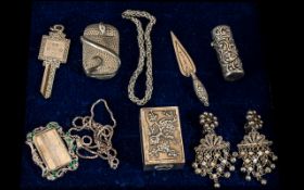 A Small Mixed Lot, comprising an embossed silver scent bottle, hallmarked for Birmingham U 1894,