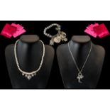 Three Bibi Bijoux Items, comprising a silver and bead necklace with heart charms,