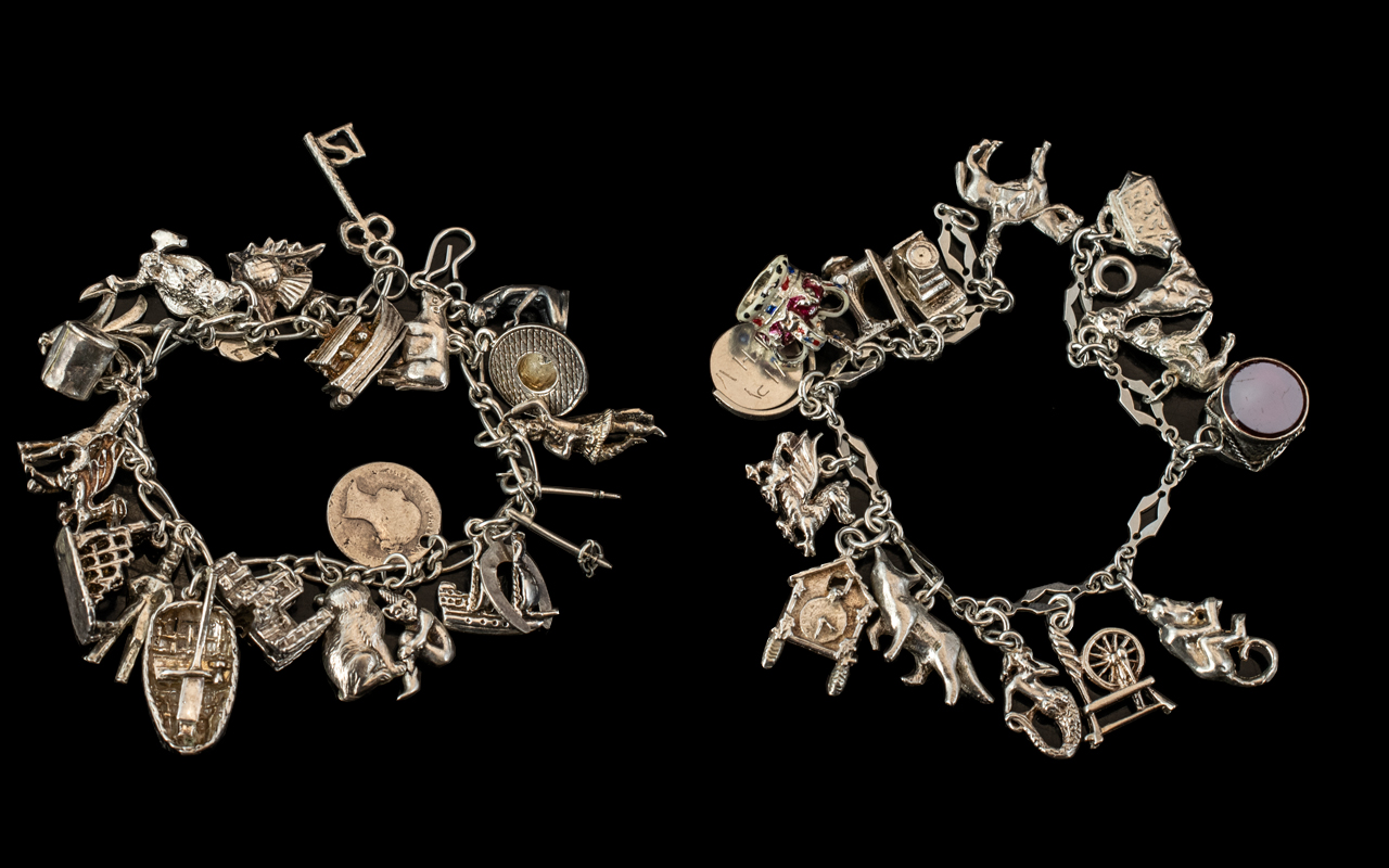 A Fine Pair of Vintage Sterling Silver Charm Bracelets Loaded with 35 Silver Charms of Good Quality,