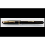1950's Waterman's Fountain Pen, with a 14ct W-2A gold nib. Black with gilt trim.
