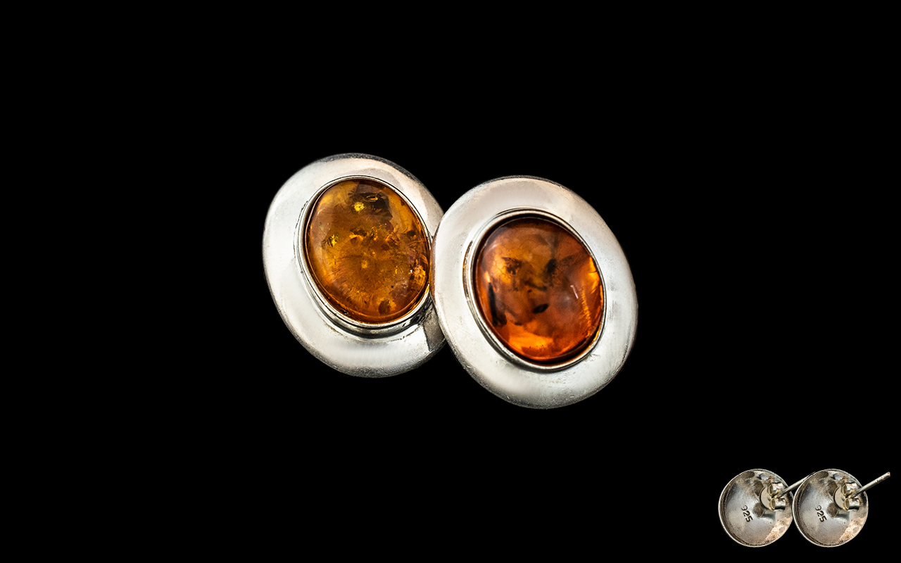 A Pair of Vintage Amber and Silver Earrings fully hallmarked for 925 silver. Superb condition.