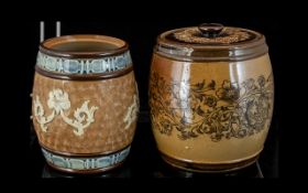 Royal Doulton Tobacco Jars. Doulton Tobacco Jars, two in total, one has missing lid.