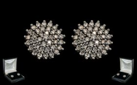 18ct White Gold Attractive Pair of Diamond Set Cluster Earrings of Circular Form. Marked 18ct - 750.