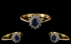Ladies 18ct Gold - Attractive Sapphire and Diamond Set Cluster Ring.