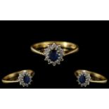 Ladies 18ct Gold - Attractive Sapphire and Diamond Set Cluster Ring.