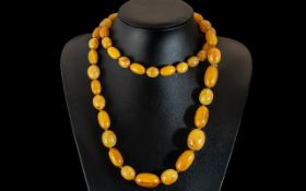 Graduated Amber Coloured Bead Necklace.