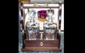 Wooden Tantalus with Decanters. Tantalu