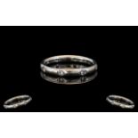 18ct Gold Diamond Band, set with eight r