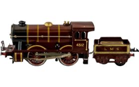 Hornby 4312 O-Gauge LMS Clockwork Steam Locomotive and Tender. Date 1920's.