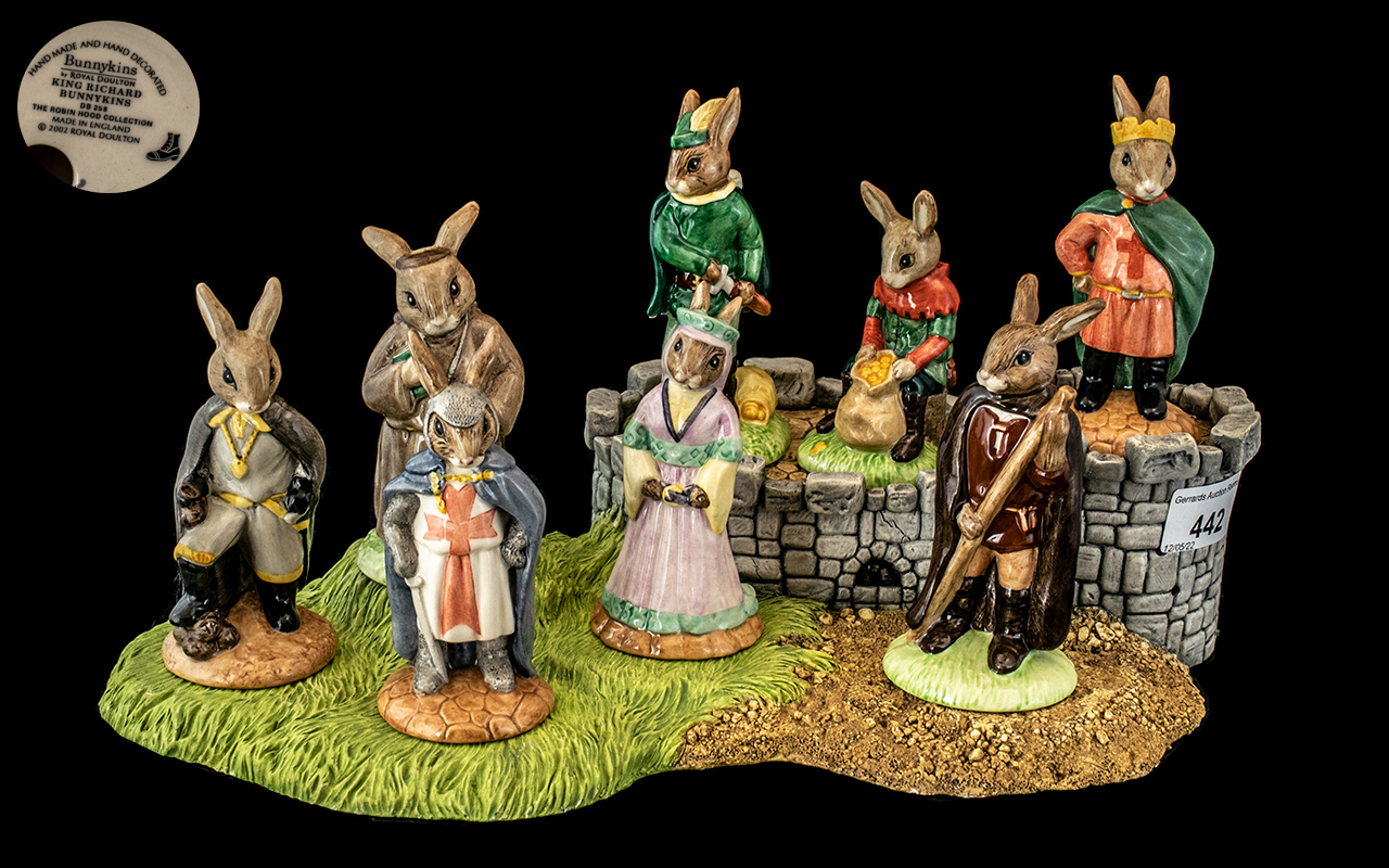 Royal Doulton 'Bunnykins' Robin Hood Collection with Stand, comprising Robin Hood, Sheriff of
