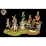 Royal Doulton 'Bunnykins' Robin Hood Collection with Stand, comprising Robin Hood, Sheriff of