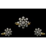 Ladies Superb 18ct Gold Diamond Set Cluster Ring, the brilliant cut diamond of white colour,