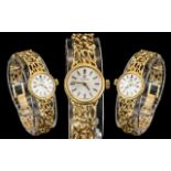 Omega - Elegant Ladies 9ct Gold Wrist Watch, With Integral Open worked Design 9ct Gold Bracelet.