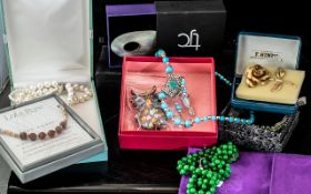 Collection of Boxed Costume Jewellery, comprising a Butler & Wilson crystal decorated owl brooch,