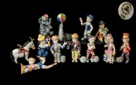 Royal Copenhagen Mini Circus Collection A set of 12 circus figures comprising Clown with Guitar,