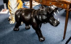 A Large Leather Clad Style Hippopotamus realistically modelled, height 29 inches, length 38 inches.