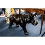 A Large Leather Clad Style Hippopotamus realistically modelled, height 29 inches, length 38 inches.