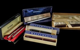 Collection of Fountain Pens, to include a Sheaffer Snorkel red barrel and cap with box,