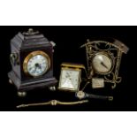 Three Mantle Clocks, comprising a Victorian brass clock,