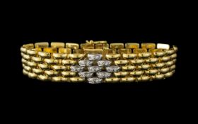 An 18ct Gold Diamond Set Bracelet panther design, central links set with round brilliant cut