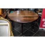 Drop Leaf Table raised on cabriole legs, with two lift up sides, finished in a polished oak wood,