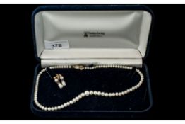A 16 inch Graduation Pearl Necklace with 9ct gold clasp, together with a pair of pearl and