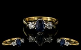 Ladies 18ct Gold - Attractive 3 Stone Diamond and Sapphire Set Dress Ring.
