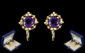 Ladies Pair of 18ct Gold Amethyst Set Earrings.