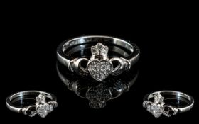 Diamond Set Claddagh Ring, the two clasping hands, representing friendship, here holding a crowned