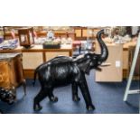 A Large Leather Clad Style Elephant trunk up, realistically modelled.