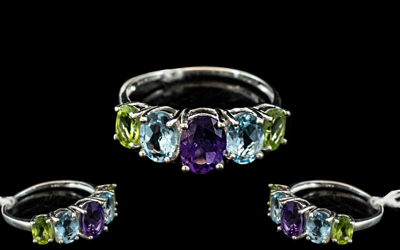 Amethyst Blue Topaz and Peridot Five Stone Ring, five oval cut, graduated stones,