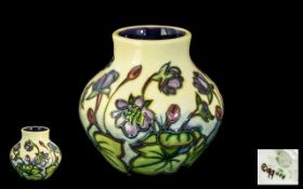 Small Moorcroft Vase, Moorcroft pottery Hepatica vase designed by Emma Bossons, squat ovoid form,