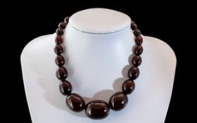 Early 1920s Superior Quality Cherry Amber Graduated Beaded Necklace with screw fit clasp;