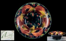 William Moorcroft Signed Footed Bowl ' Ochre Pomegranate ' On Blue Ground. c.1920's. Diameter 8.