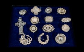 A Fine Collection of Antique and Early 20th Century Sterling Silver Brooches,