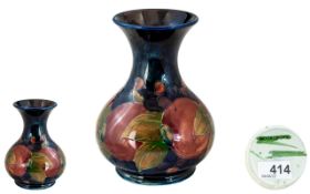 William Moorcroft Signed Bulbous Vase ' Pomegranates ' Design on Blue Ground. c.1920 - 1930's. 5.