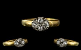 An 18ct Gold Diamond Ring set with 4 old cut diamonds ring size N