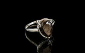 Golden Sheen Sapphire Pear Cut Solitaire Ring,