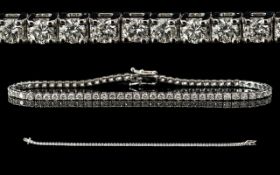 18ct White Gold - Attractive and Elegant Diamond Set Tennis Bracelet. Marked for 750 - 18ct.