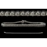 18ct White Gold - Attractive and Elegant Diamond Set Tennis Bracelet. Marked for 750 - 18ct.