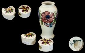 Three Pieces of Moorcroft, to include two trinket dishes and a 7" vase, Anemone pattern.