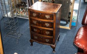 Bow Fronted Small Chest of Drawers. Dovetail and brass fittings. Four drawers, raised on four ball