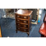 Bow Fronted Small Chest of Drawers. Dovetail and brass fittings. Four drawers, raised on four ball