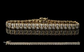 9ct Yellow Gold Diamond Set Line Bracelet with full hallmark for 9.375, est. diamond weight 0.