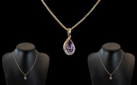 Ladies 9ct Gold Attractive Amethyst Set Pendant Drop with Attached 9ct Gold Box Chain.