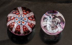 Two Scottish Paperweights, a Caithness pale pink swirl, and a Strathern multi-coloured paperweight.